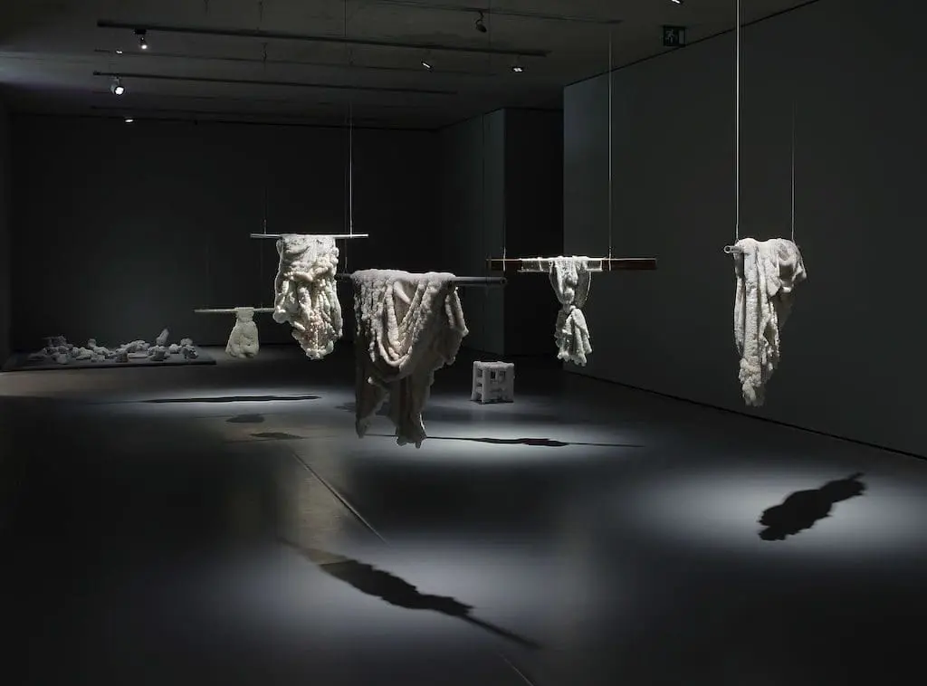 Sigalit Landau Littoral, 2017, fishing nets, table cloths, and stool coated in salt crystals, Sigalit Landau. Salt Years, exhibition view, Mönchsberg © Museum der Moderne Salzburg, Photo: Rainer Iglar